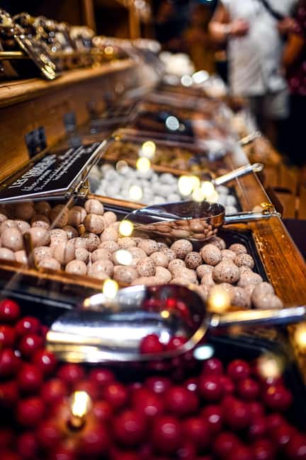 Paris: Montmartre Food Tour with 10 Local Tastings & Wines - Logistics That Can Trip You Up: Meeting Points, Orange Umbrella, and Rain Plans