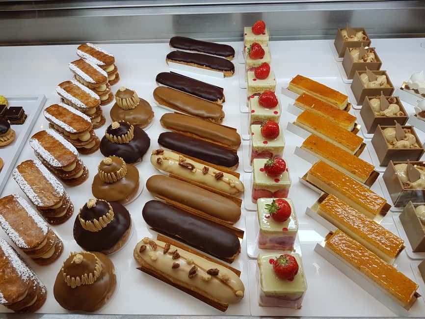Paris: Notre Dame & Latin Quarter Food Tour with 8+ Tastings - The secret place break: flavors, stories, and wine