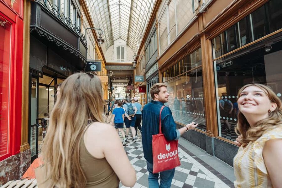 Paris: Pastries and Chocolate Walking Food Tour - Entering Paris’s pastry route, from Rue du Faubourg Montmartre