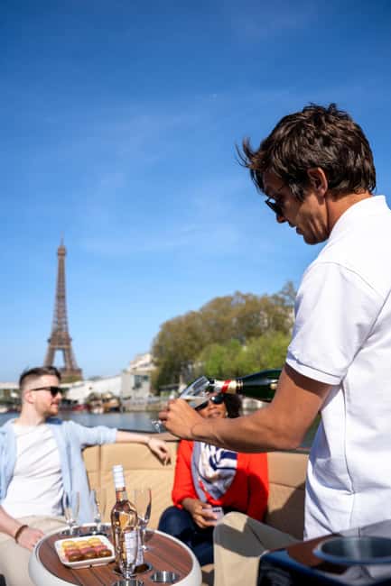 Paris: Private Small Boat Cruise with Rosé and Macarons - From Île aux Cygnes toward the Eiffel Tower, fast and scenic
