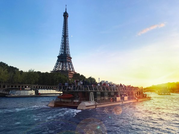 Paris Seine River Sightseeing Cruise with Commentary by Bateaux Parisiens - Comfort on board: glass shelter, seating, and what to bring