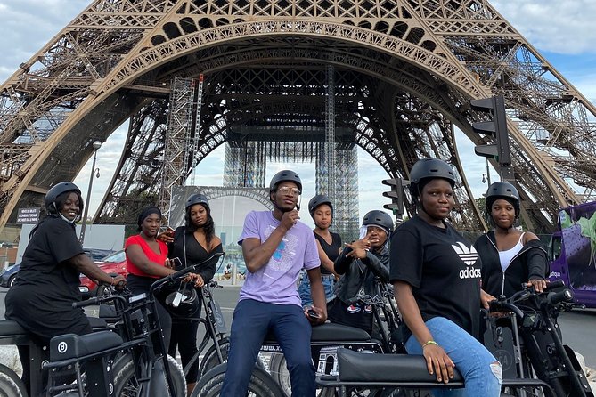 Paris Sightseeing Family Friendly Guided Electric Bike Tour - Place Vendôme, the Louvre area, and quick iconic views