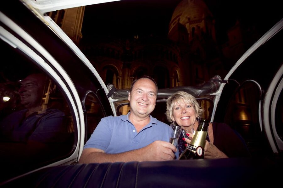 Private tour of Paris by Night with Champagne - Central Paris drive-by classics: Louvre, Notre Dame, and Opera Garnier