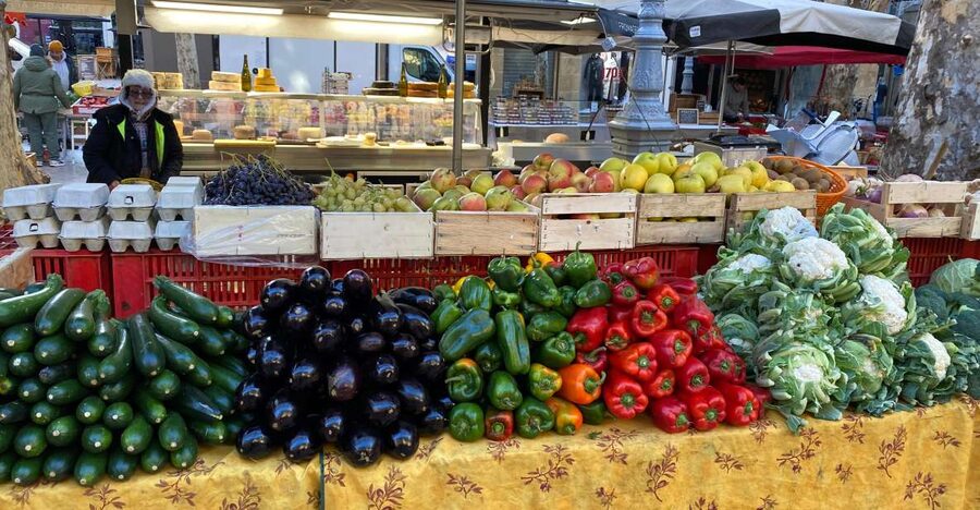 Provencal Market Walking Tour with Tastings - Place des Prêcheurs: spices, Corsican meat, and a schedule reality check