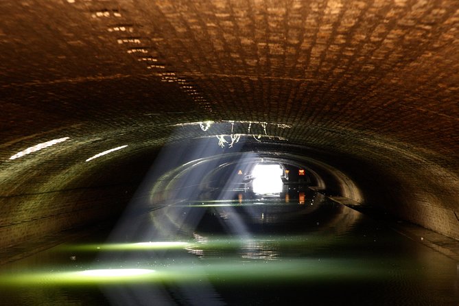 Seine River Cruise and Paris Canals Tour - Place de la Bastille tunnel: the darker, quieter part of the trip