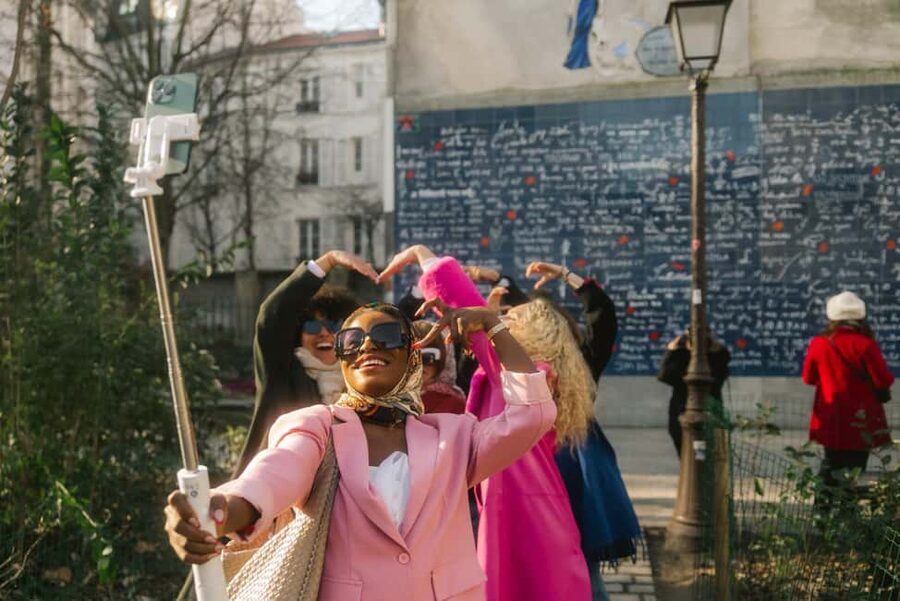 The Official Emily in Paris Montmartre Walking Tour - Moulin Rouge photo stop: quick, iconic, and a good warm-up