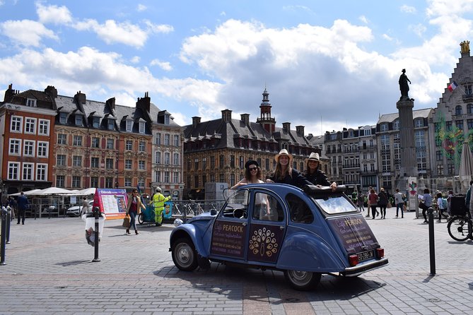 Unique Tour of Lille by Convertible 2CV - 1h00 - Meeting at Place Rihour and getting oriented fast