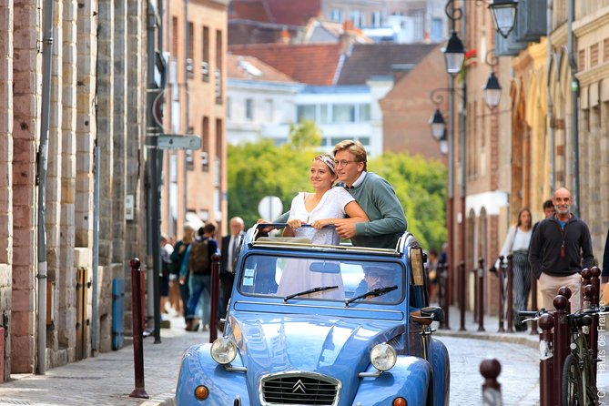 Unique Tour of Lille by Convertible 2CV - 1h00 - Cathedrale de la Treille and Hospice Comtesse, museum and cathedral vibes