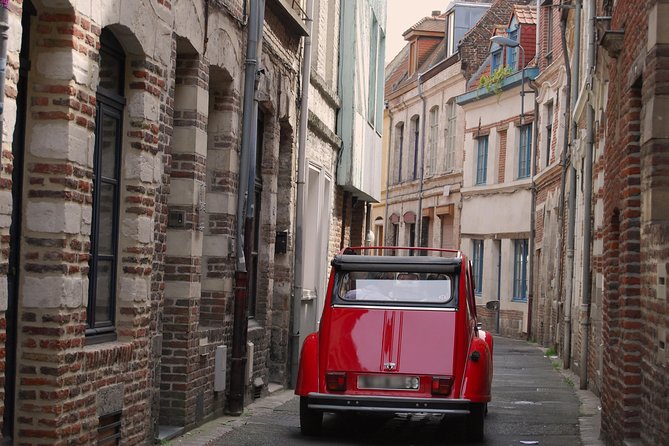 Unique Tour of Lille by Convertible 2CV - 1h00 - Old streets, Flemish-style architecture, and how you learn the city’s “map”