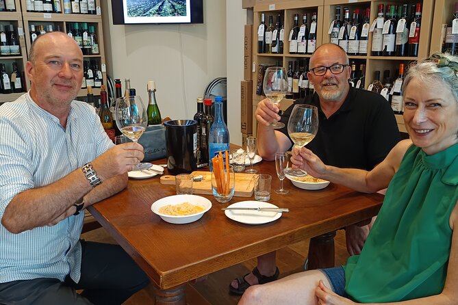 Wine Discovery Tasting In Carcassonne - The food pairing table: cheeses, charcuterie, bread, and dips