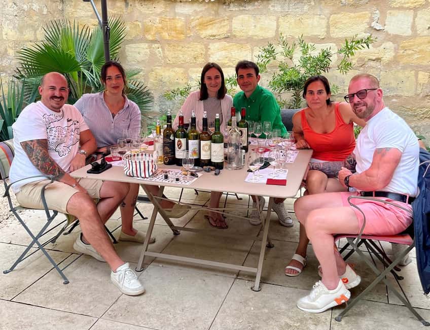 Workshop Bordeaux wine tasting: 4 reds & charcuterie pairing - Finding the hidden room behind the Guy Hoquet sign